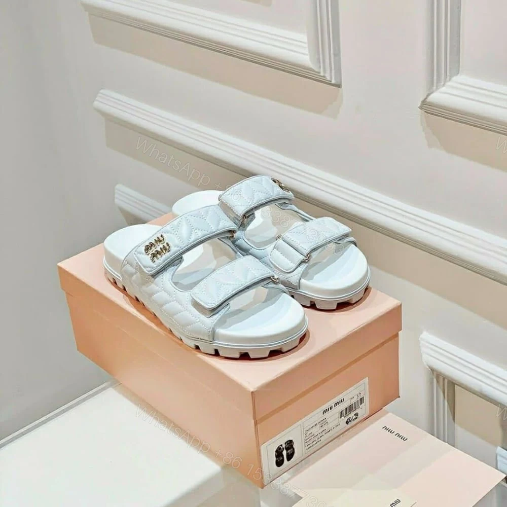 View 2 of MIUMIU MATELASSE NAPPA LEATHER SLIDES WHITE
