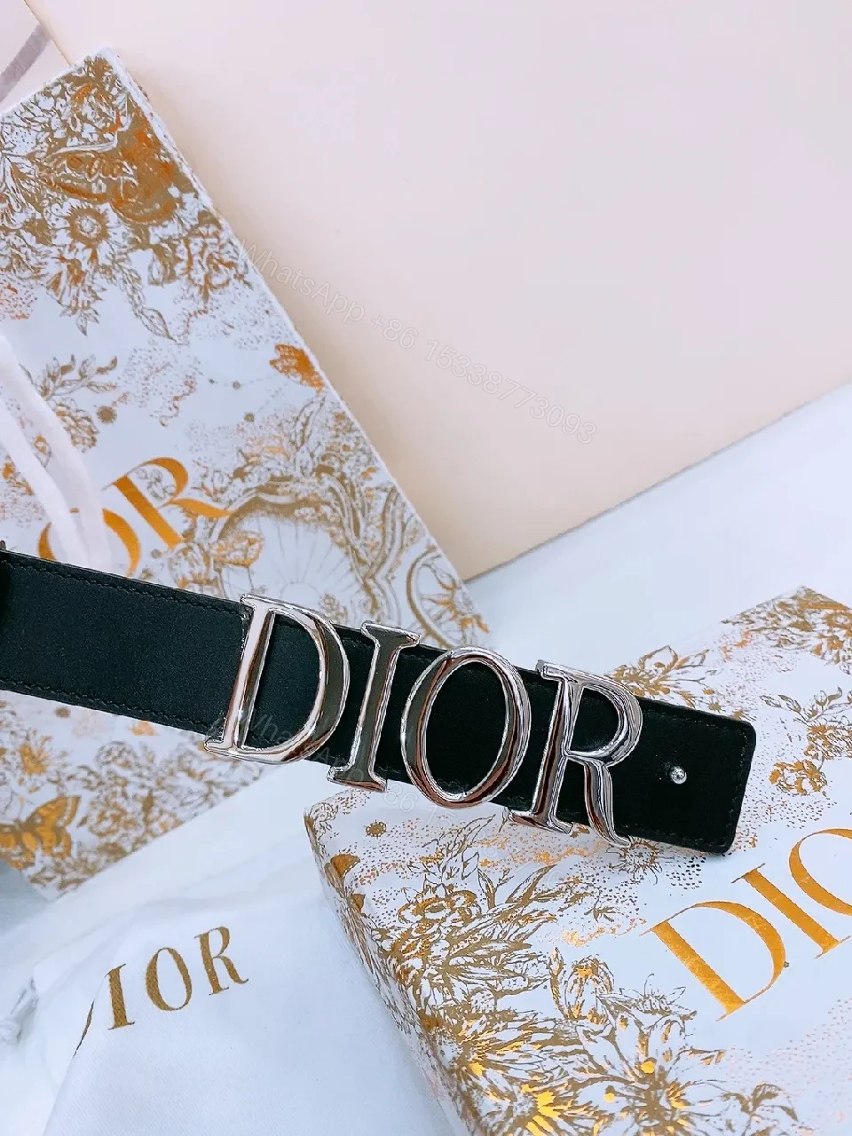 View 6 of Chic Black Leather Belt with Logo Buckle—Statement Accessory