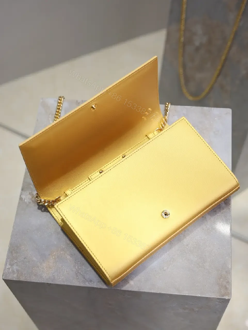 View 3 of Gold-Tone Leather Clutch Wallet with YSL Hardware