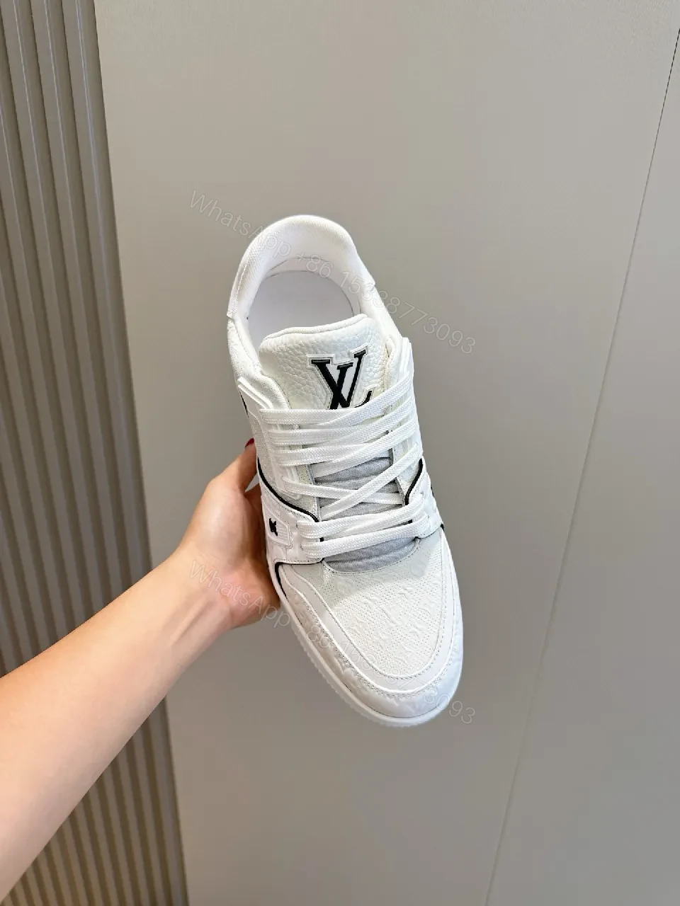 View 8 of White Leather Luxury Sneakers: Subtle Designer Edges, Comfort