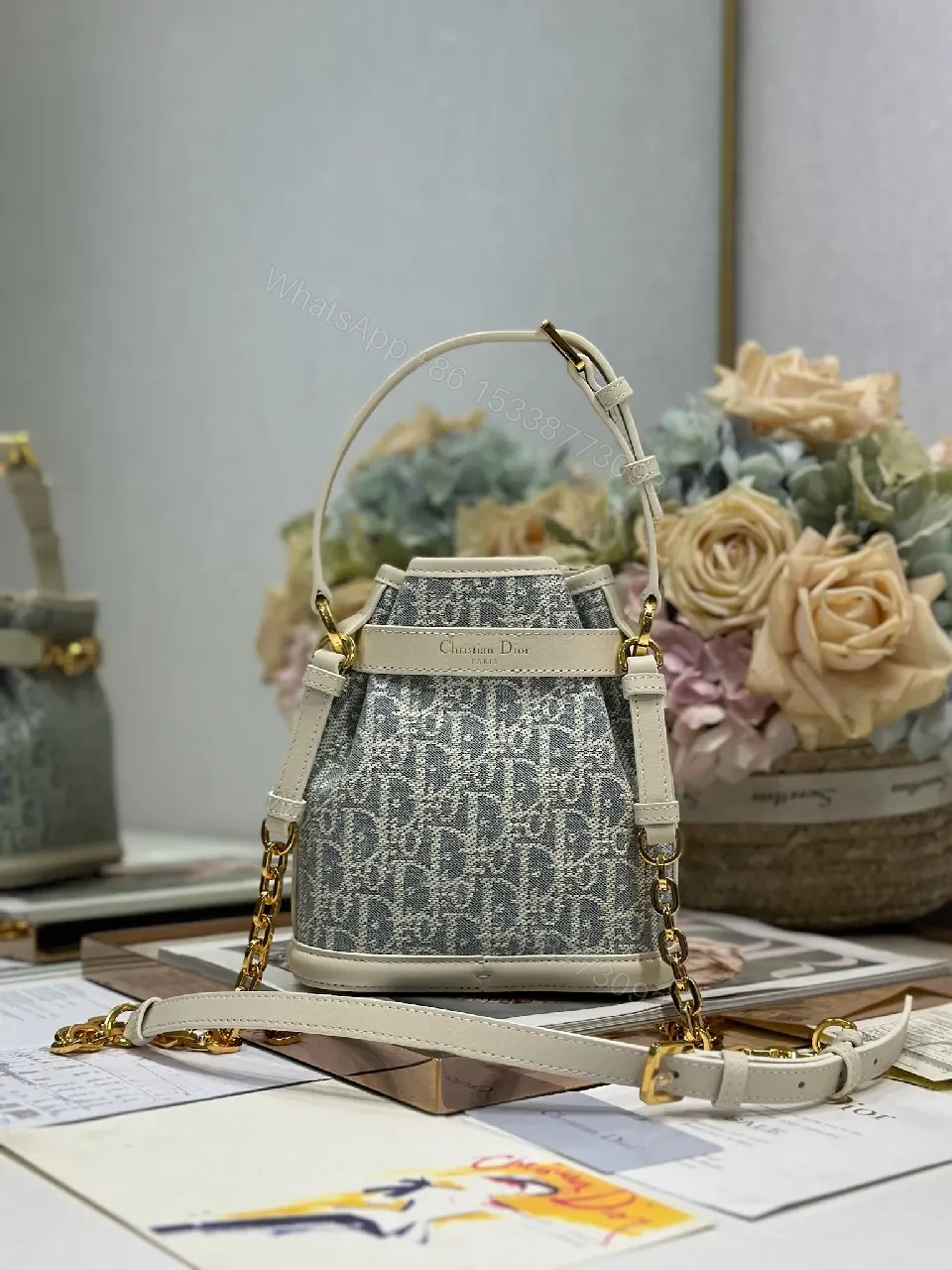 View 7 of Compact Monogram Buckets Bag with Luxe Hardware