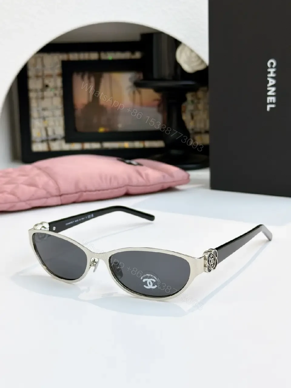 View 7 of Gold Cat-Eye Sunglasses with Chanel Logo Accents