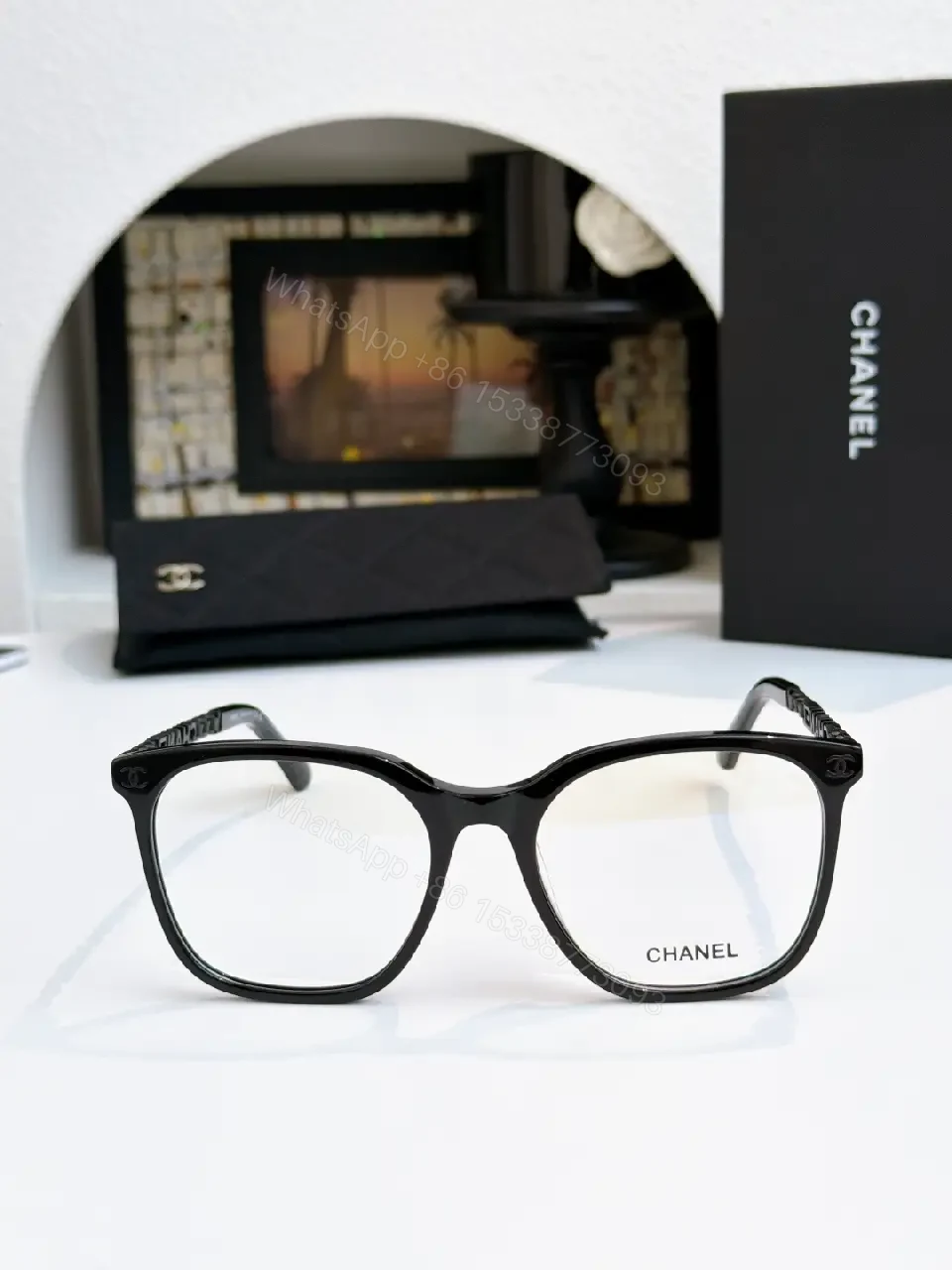 View 7 of Clear Translucent Frame Modern Oversized Sunglasses with CHANEL Accents