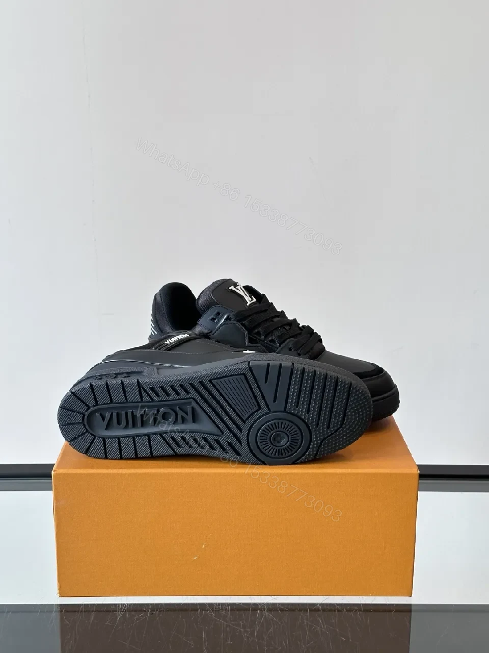 View 4 of Minimalist Black Leather Sneakers: Subtle Luxe Detailing High-Top