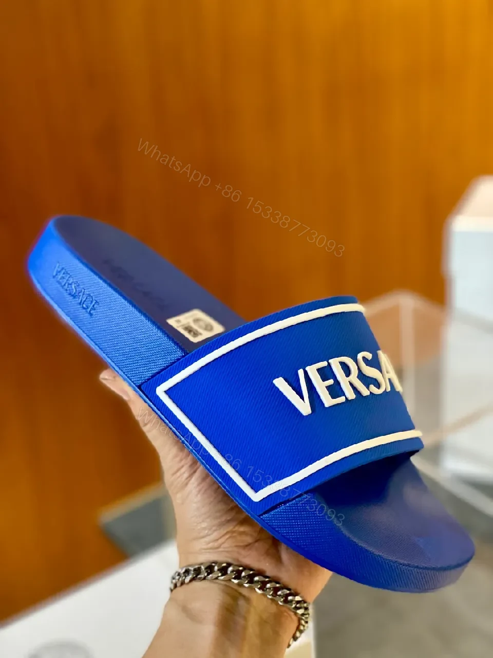 View 3 of Blue Synthetic Minimalist Slider with Bold Branding Slide Sandals