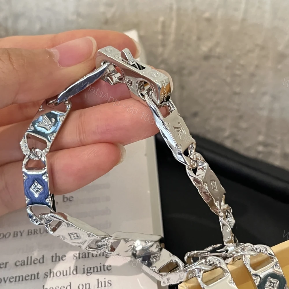 View 4 of Louis Vuitton Monogram Tied Up Necklace Silver M00919
