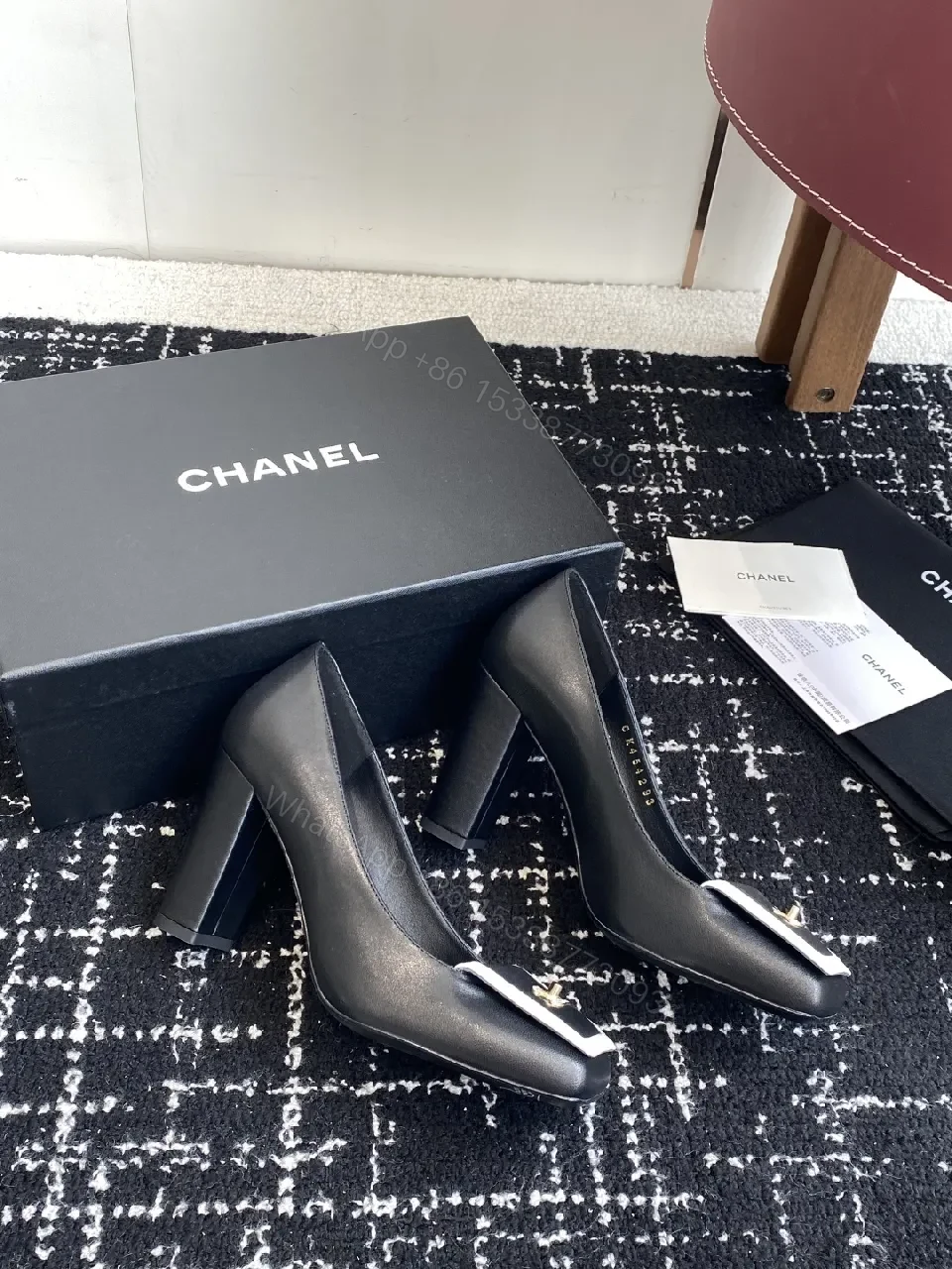 View 2 of Chic Black Leather Heels with White Trim Detail Pumps