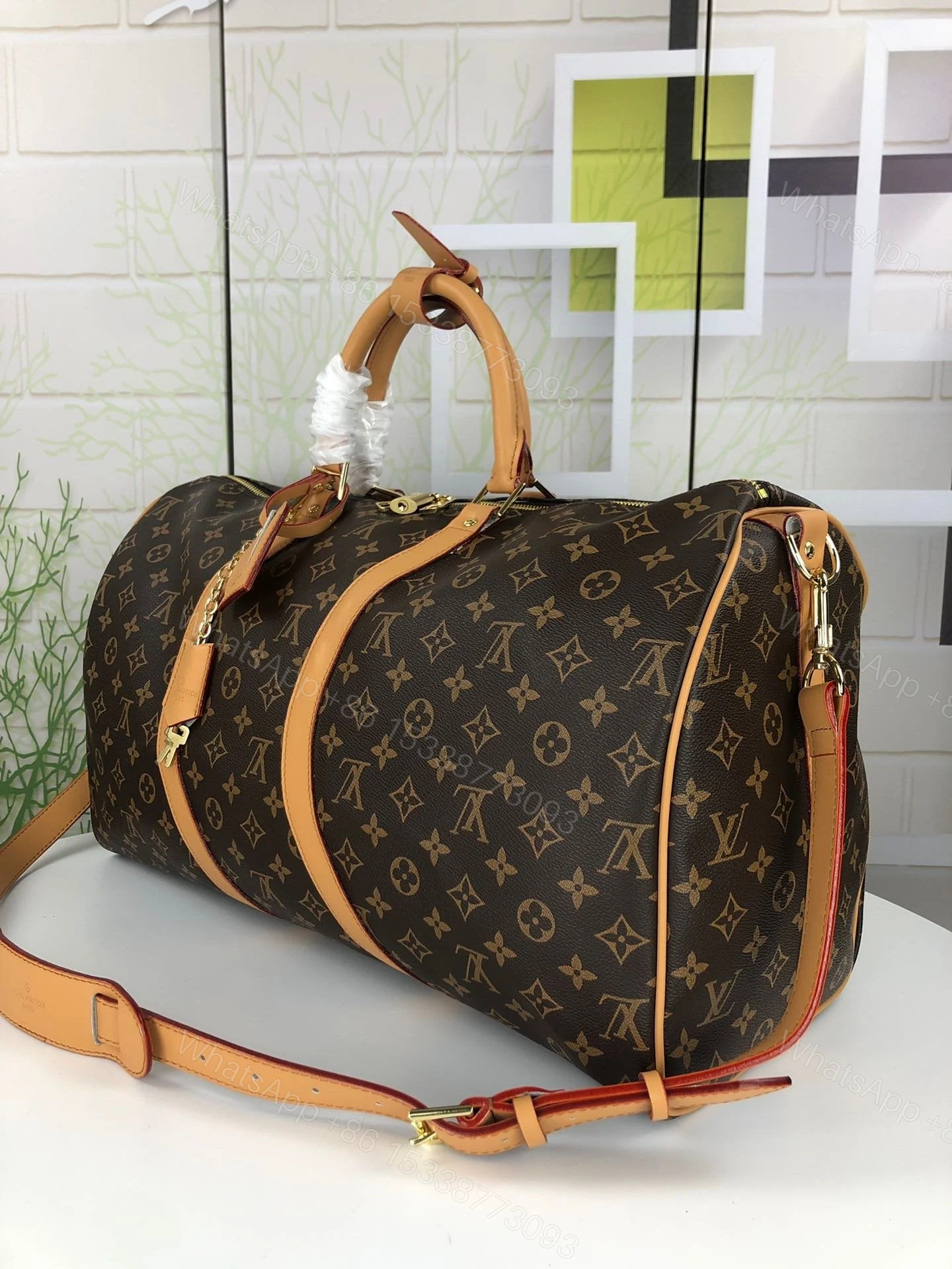 View 4 of Louis Vuitton Monogram Keepall Bandouliere 60 Travel Bag