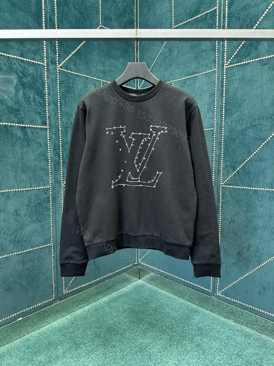Black Cotton Blend Hoodie: Subtle Lux, Handcrafted Logo, Relaxed Fit — view 1