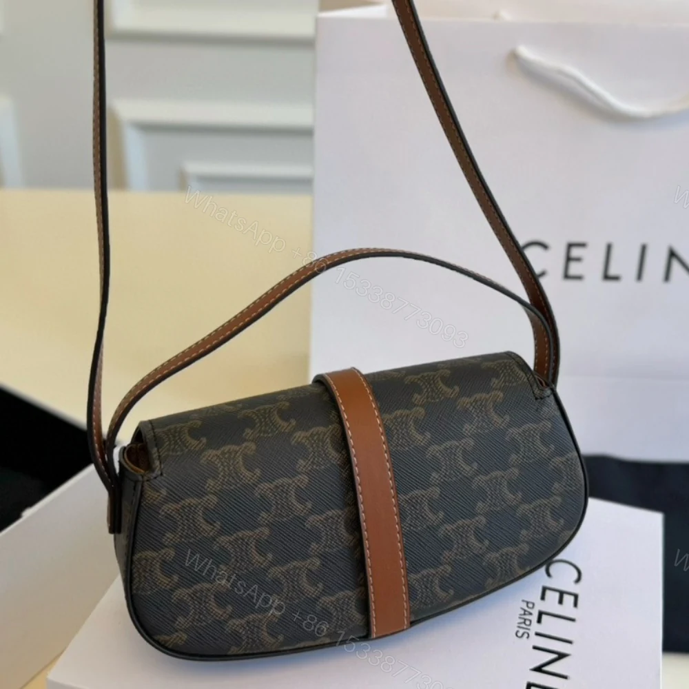 View 3 of CELINE CLUTCH ON STRAP TABOU IN TRIOMPHE CANVAS AND CALFSKIN TAN 20CM 10I592DQ2 04LU