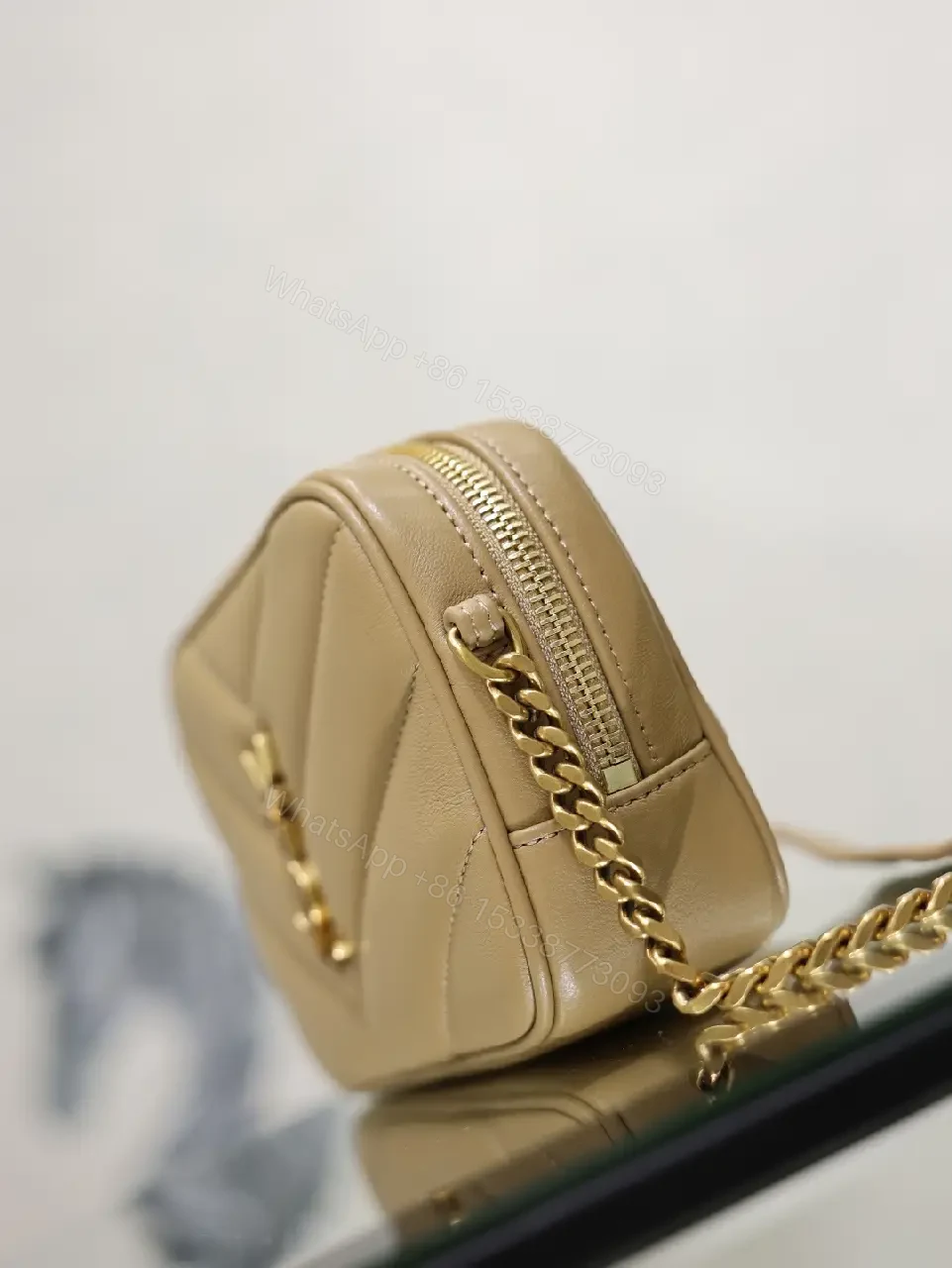 View 3 of Beige Leather Chevron Crossbody Bag with Gold YSL Logo