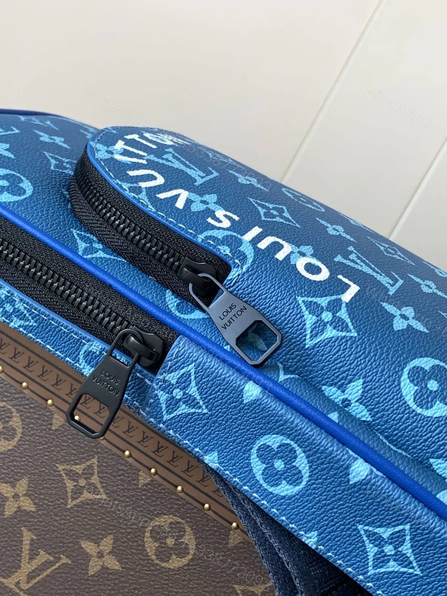 View 3 of LV AVENUE SLINGBAG 31 IN BLUE AND BROWN TAIGA LEATHER