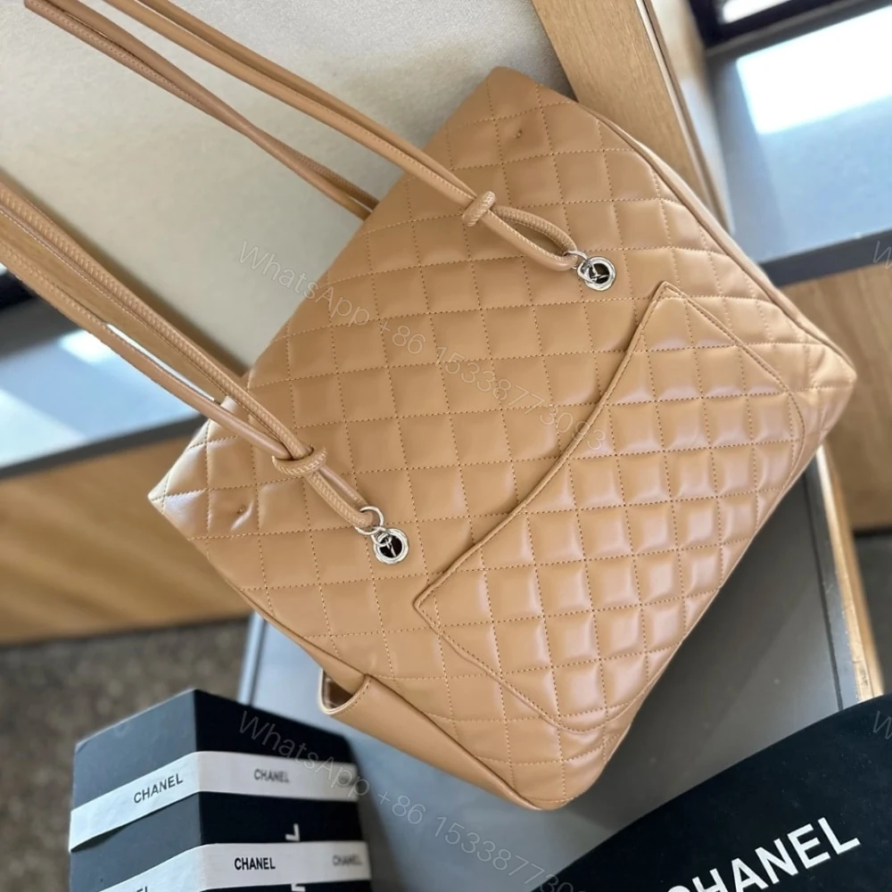 View 4 of Chanel Cambon Shopping Bag Quilted Beige And Black 36Cm
