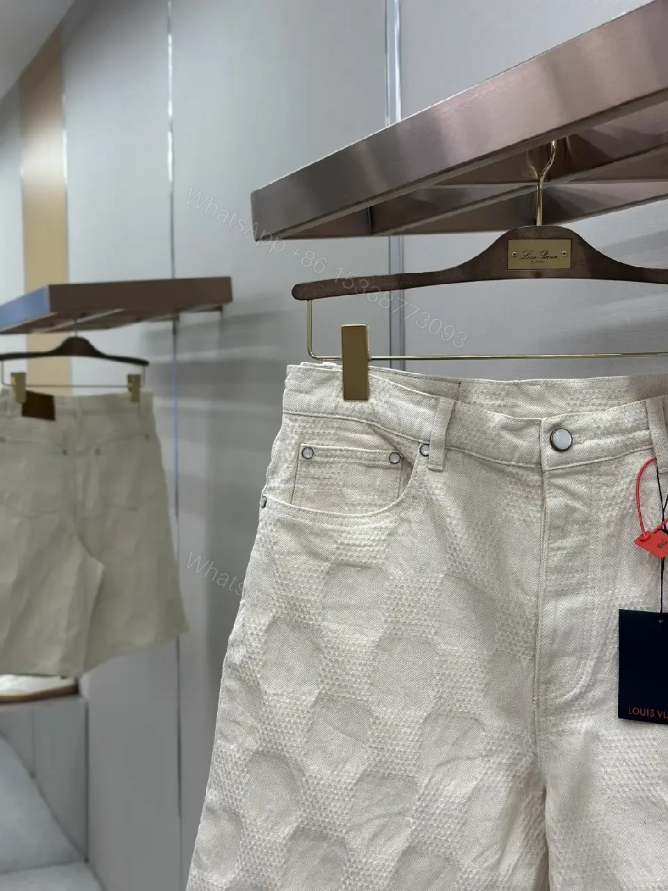 View 7 of Beige textured cotton-blend shorts with monogram-inspired print for everyday luxury