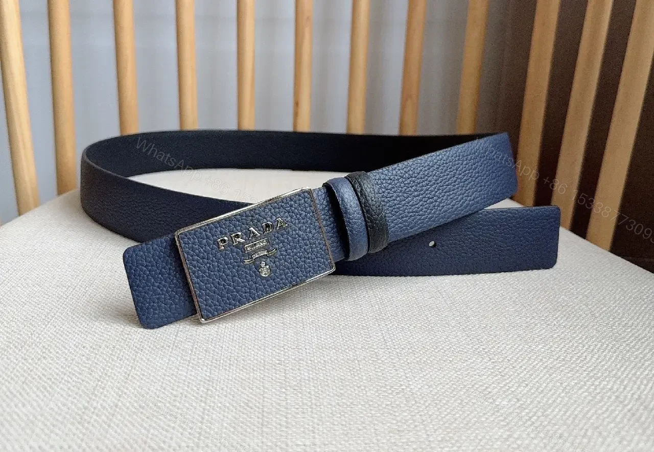 View 2 of Navy Textured Leather Belt with Brushed Metal Buckle