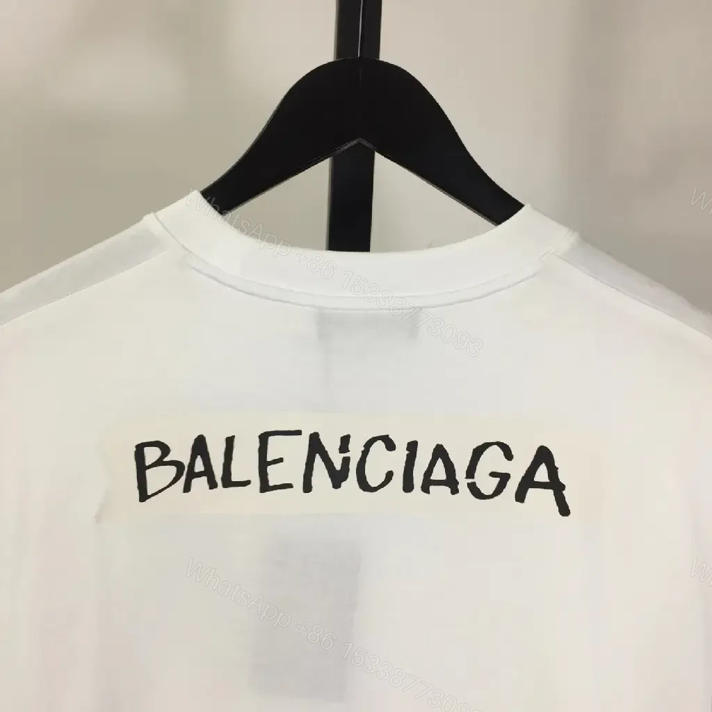 View 9 of Minimalist White Tee with Luxe Subtle Logo – Modern Essential T-Shirt