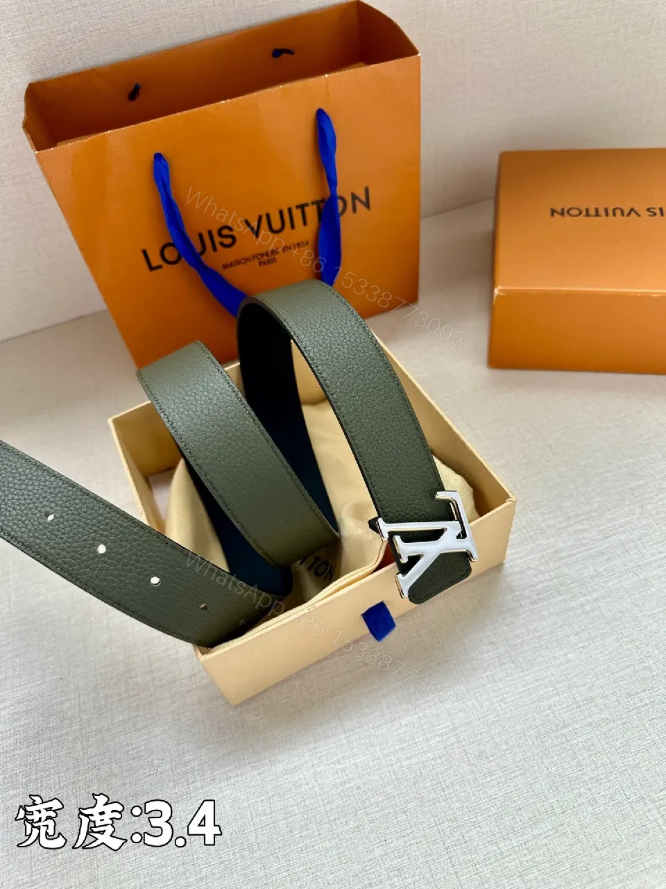 View 7 of Lux Black Pebbled Leather Belt with Iconic Buckle
