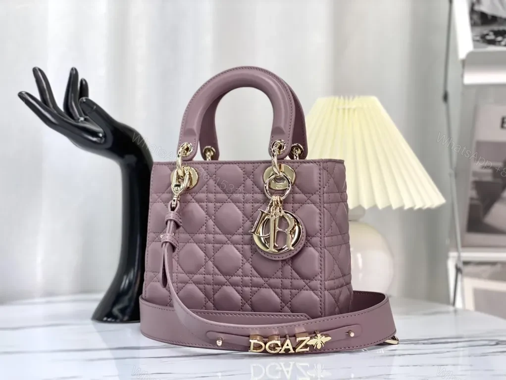 View 2 of Chic Quilted Mini Satchel with Gold Charms - All-Day Versatility
