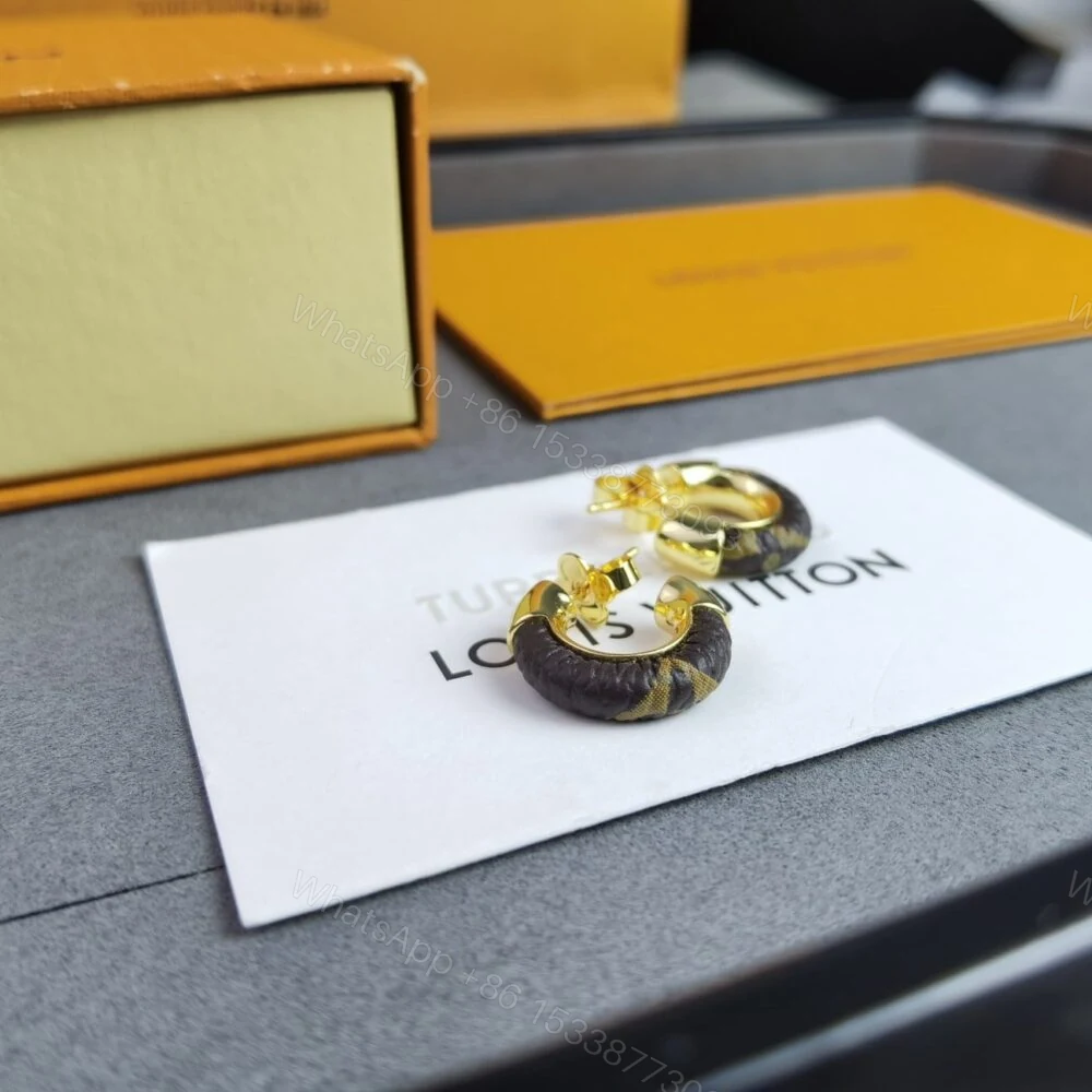 View 4 of Louis Vuitton Wild Mini Hoop Earrings M00474
