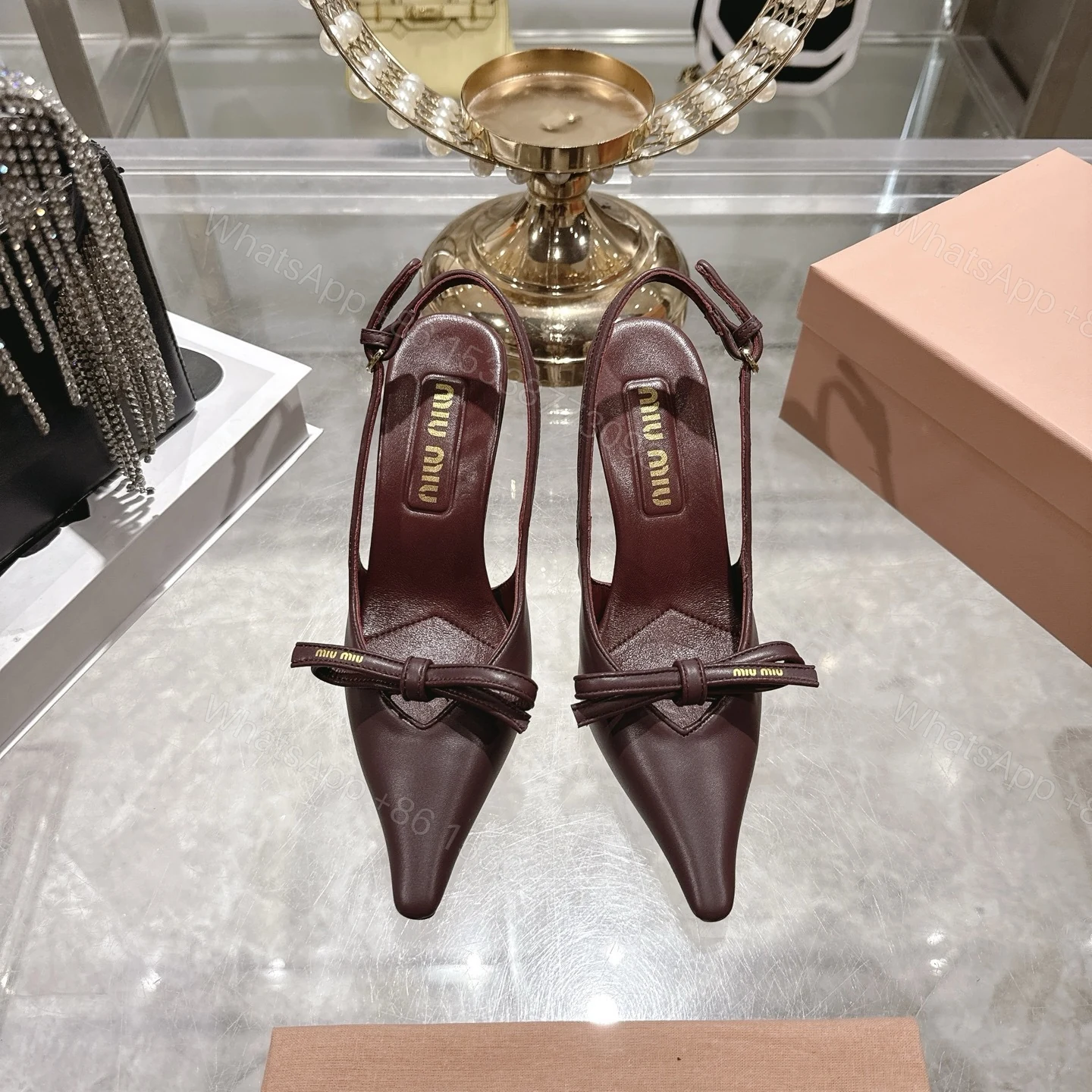 View 2 of Miu Miu Slingback Pumps With Bow Red