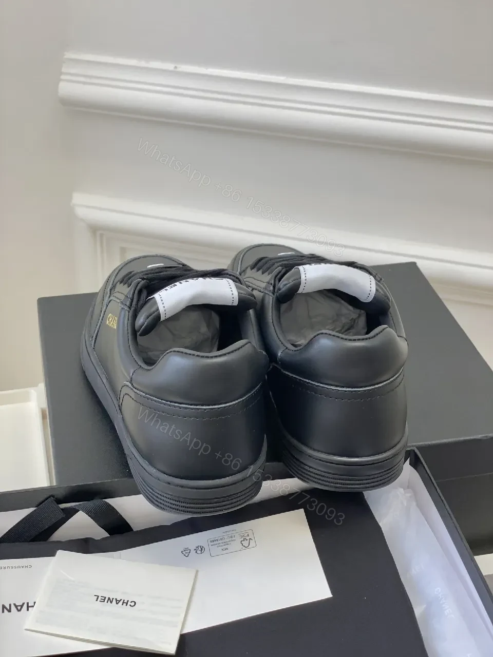 View 9 of Black Leather Sneakers, Subtle Gold Accents, High-Top Style, Everyday Luxury