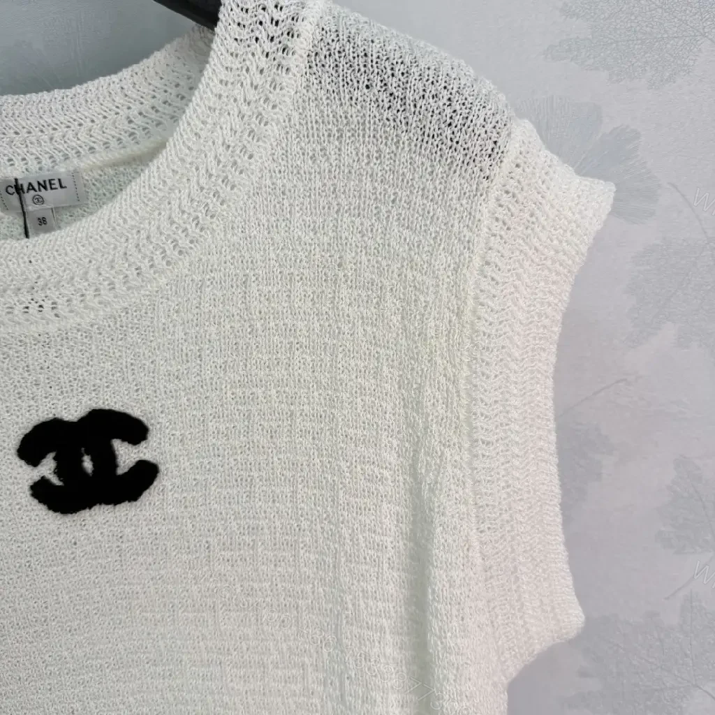 View 9 of White boucle knit relaxed-fit sweater with Chanel logo