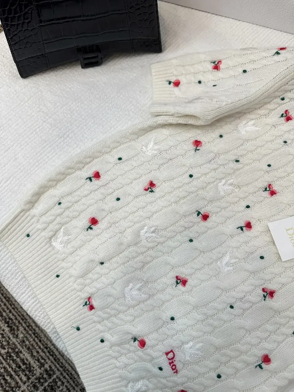 View 3 of White Cable-Knit Floral Knitwear: Subtle Luxury, Everyday Comfort
