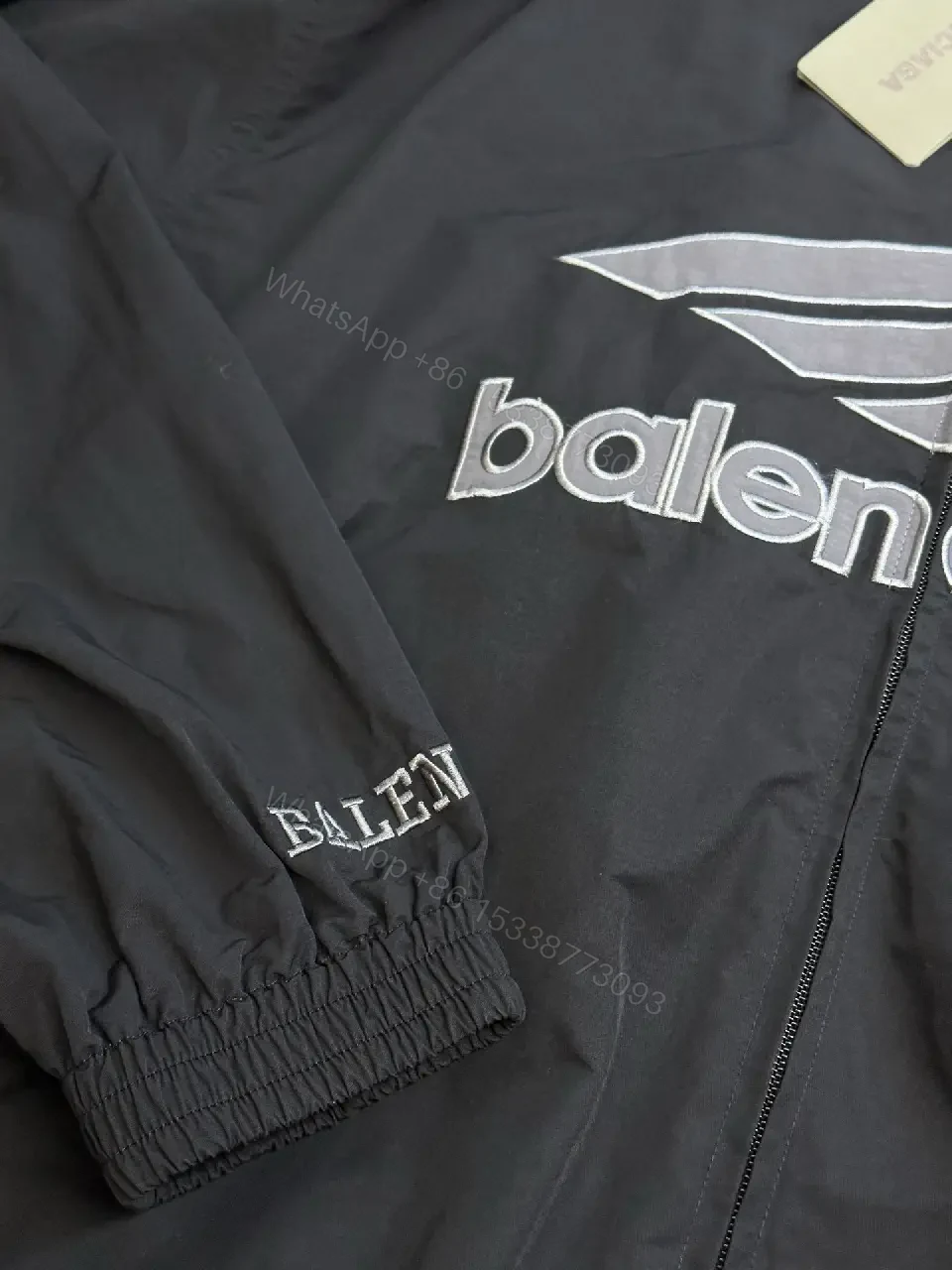 View 3 of Black Nylon Windbreaker Modern Logo-Driven Streetwear Jacket