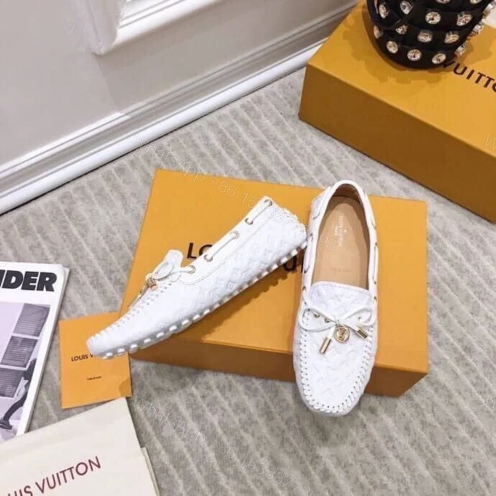 View 4 of LOUIS VUITTON WHITE MONOGRAM EMPREINTE LEATHER GLORIA LOAFERS