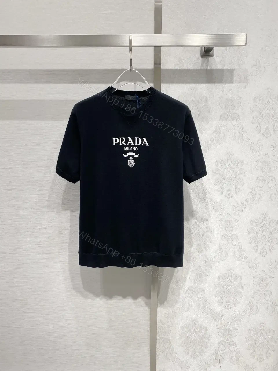 View 3 of Minimalist Cotton Tee with Crest – Elevated Everyday Essential