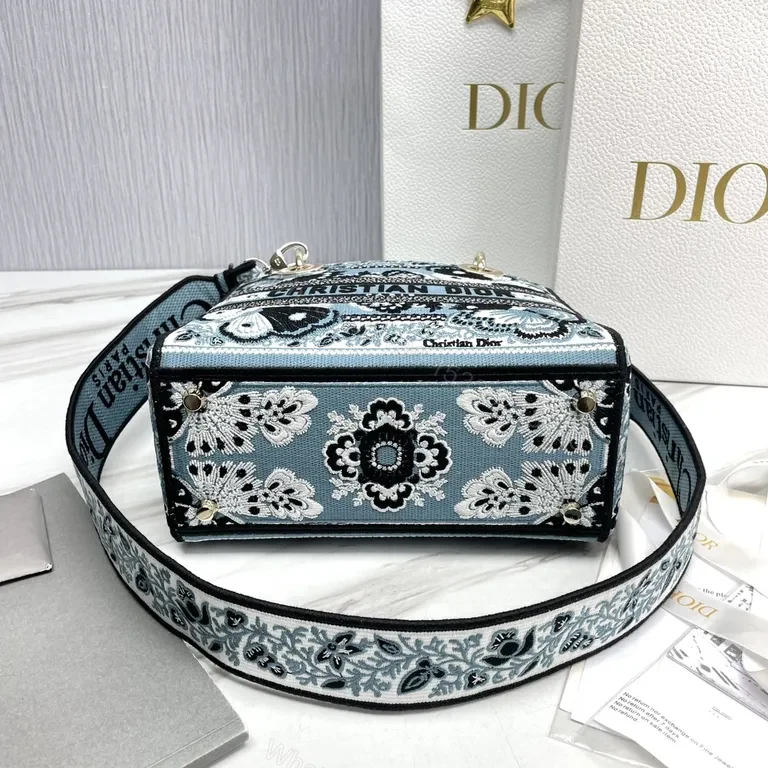 View 4 of Patterned Textured Handbag with Dior-Inspired Hardware - Everyday Luxury