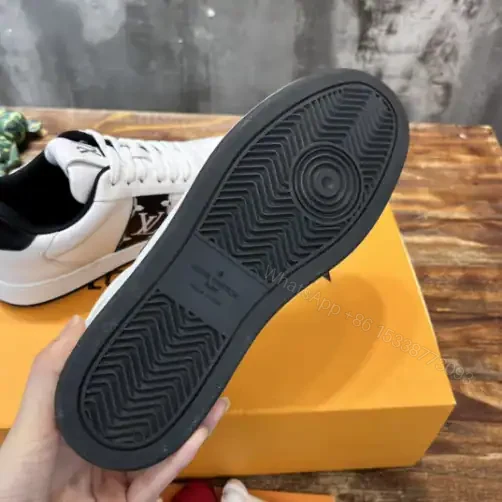 View 6 of LOUIS VUITTON RIVOLI LOW-TOP SNEAKERS IN WHITE AND BLACK – LSVT369