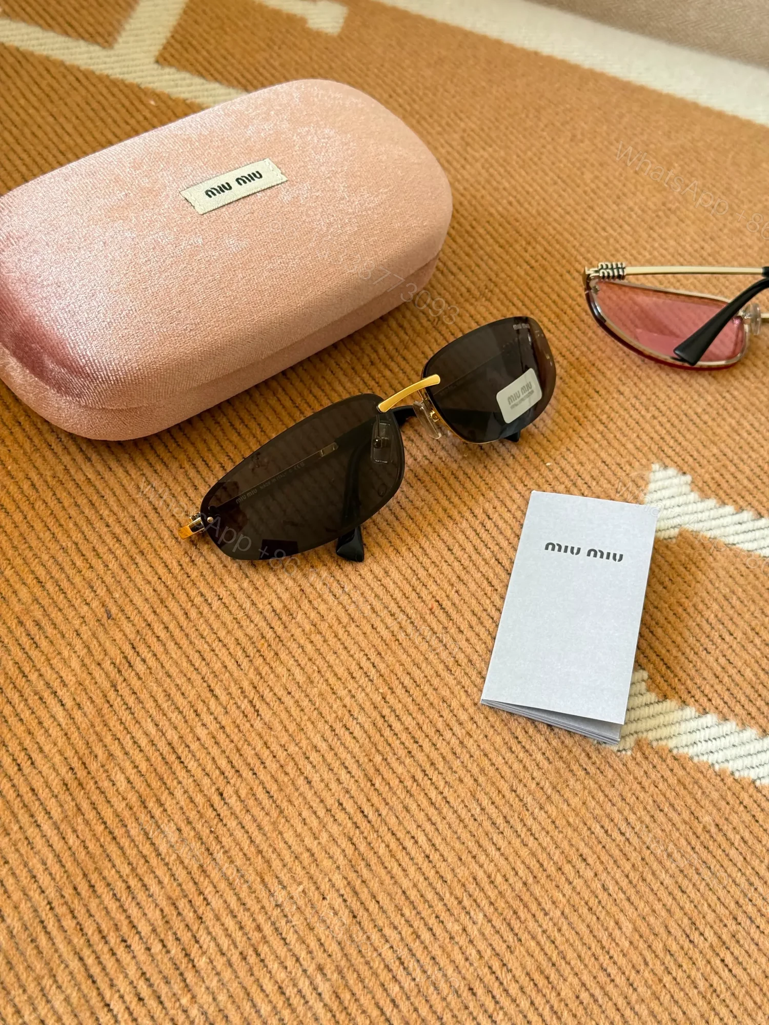 View 2 of Miu Miu Sunglasses Black