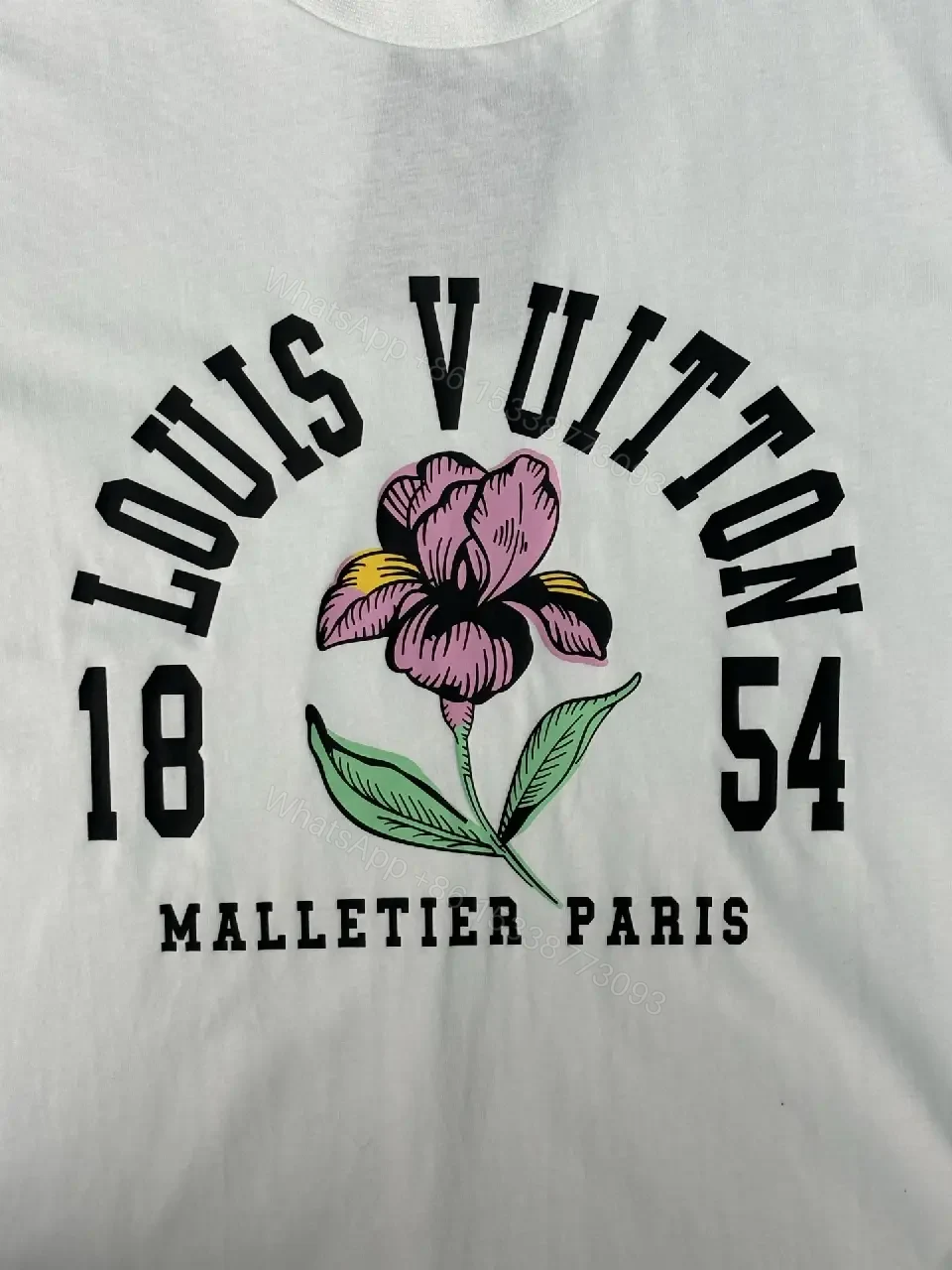 View 8 of Casual Luxury Graphic Tee: Subtle Floral, Cotton Blend, Relaxed Fit