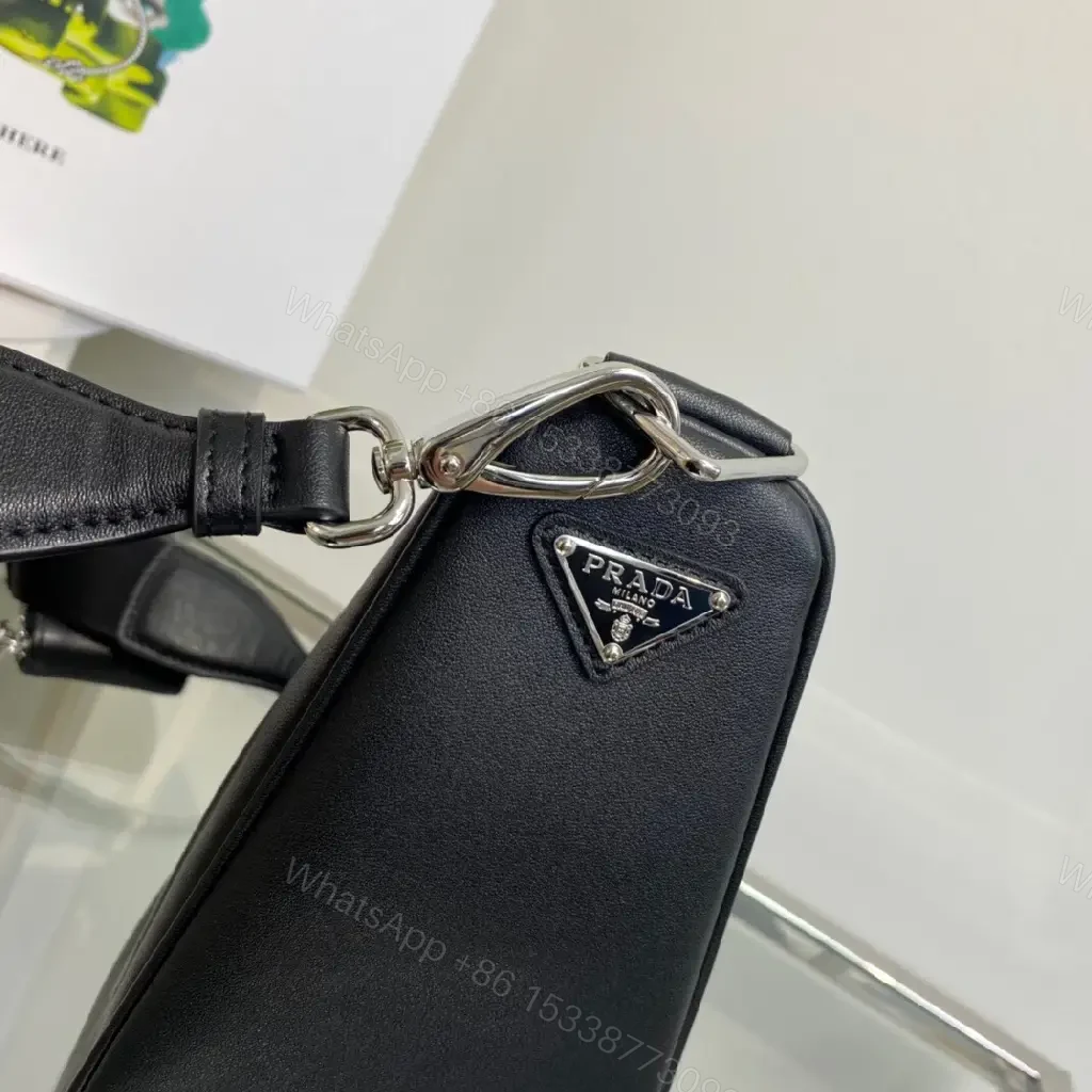 View 8 of Triangular Black Leather Belt Bag — Modern Minimalist Luxury Perforated Edge