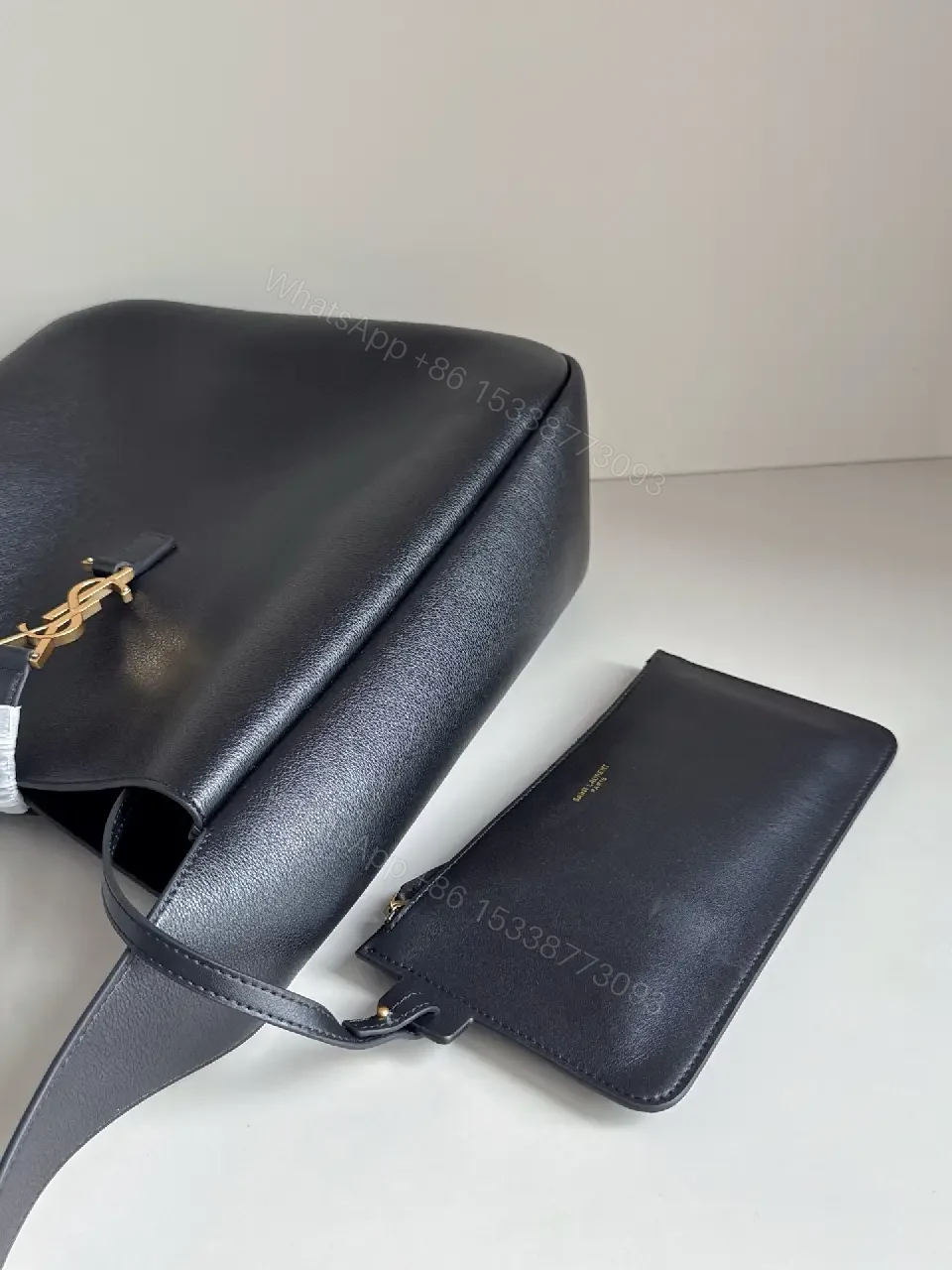 View 10 of Navy Leather Bucket Bag with Gold YSL Charm and Zippered Pocket