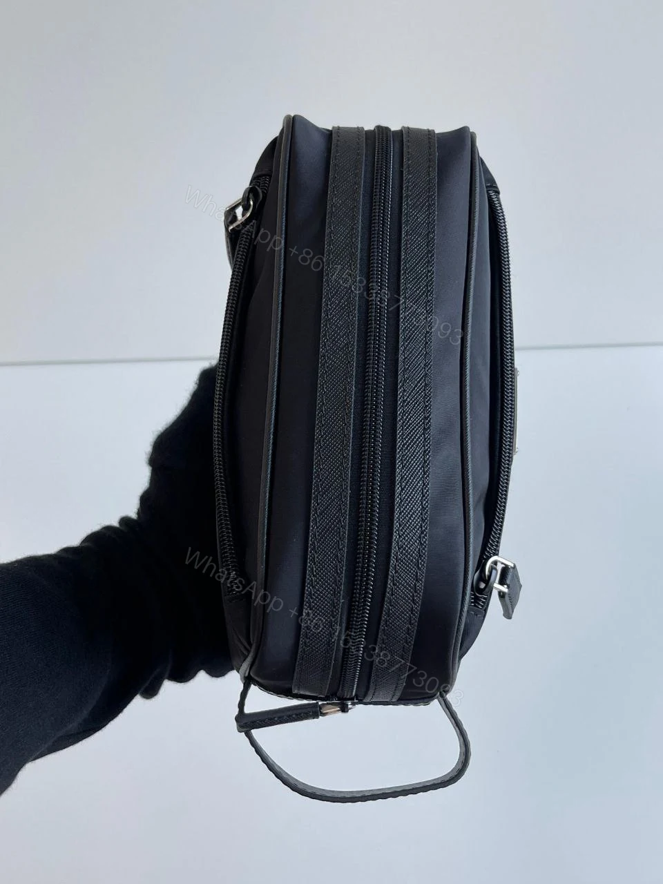 View 3 of Re-Nylon and Saffiano leather travel pouch Leather handle