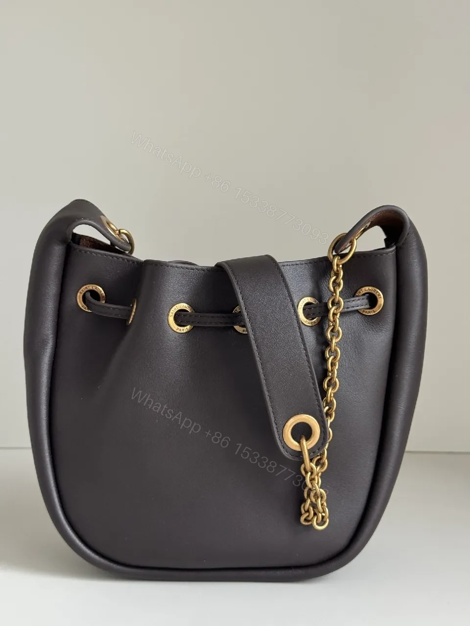 View 3 of Deep Black + Leather + Minimalist + Gold Hardware + Bucket Bag