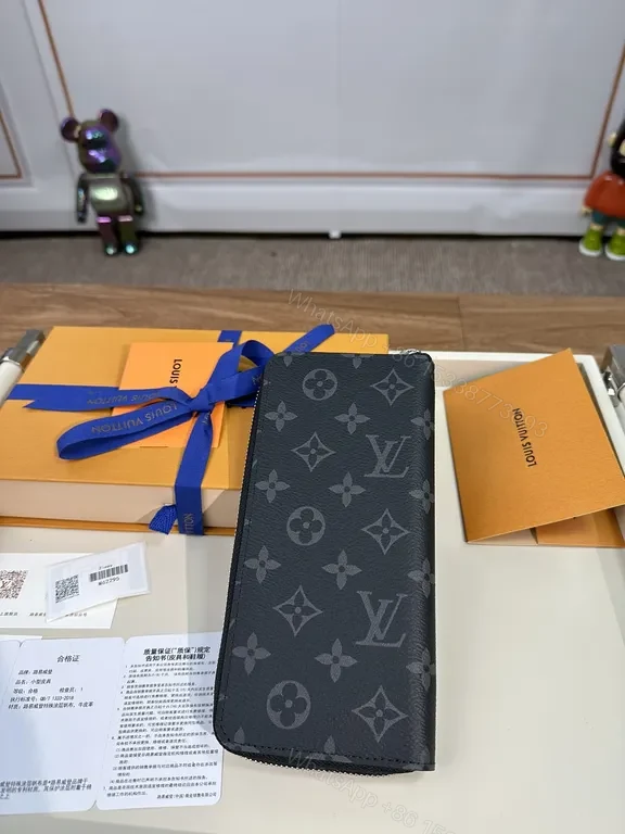 View 3 of Refined Monogram Zip Wallet: Luxury Texture, Everyday Versatility