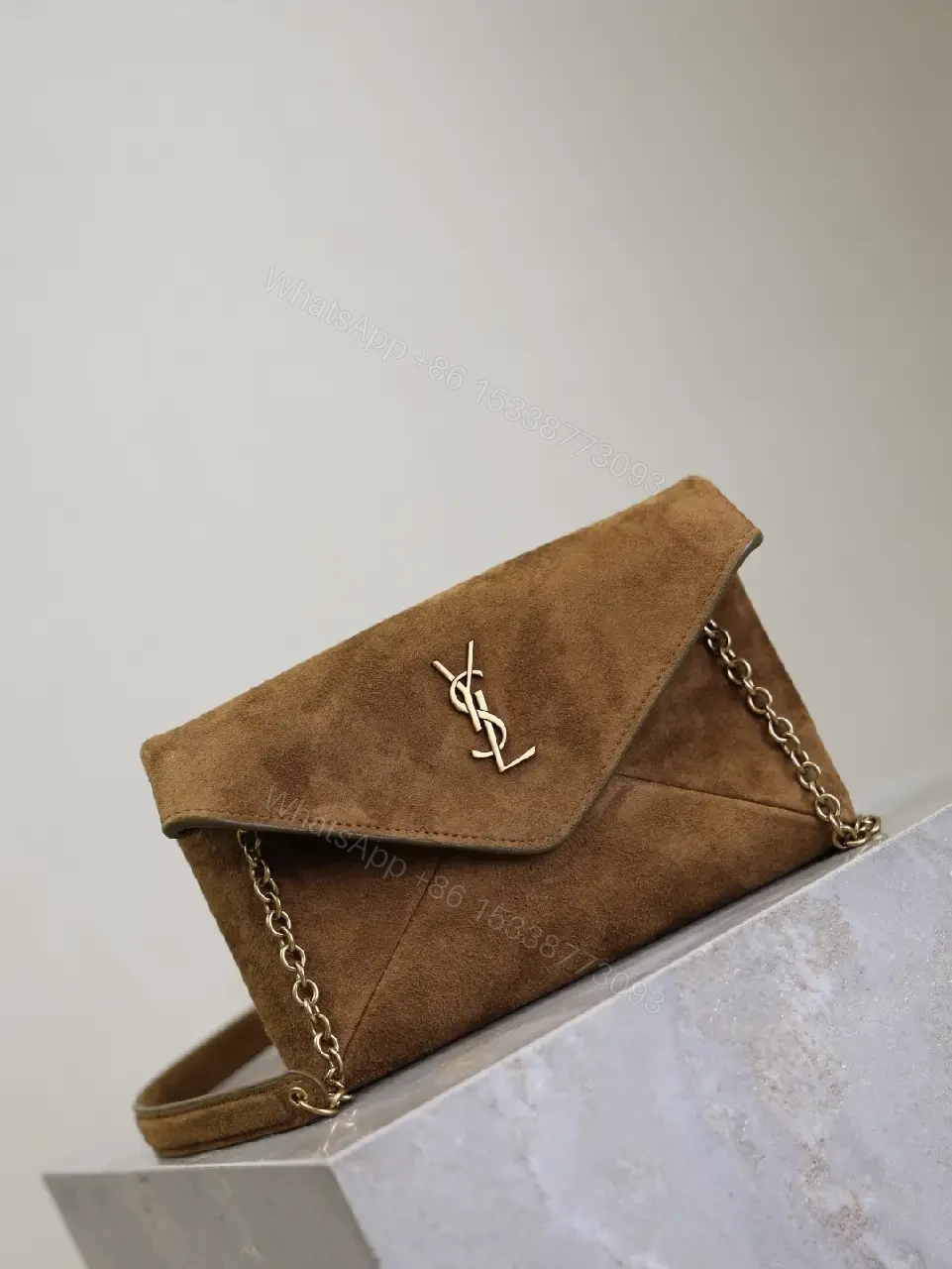 View 4 of Suede Cognac Envelope Bag with Gold Logo Clasp