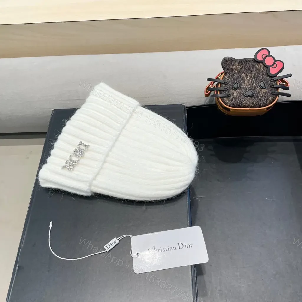 View 3 of White Knit Beanie with Dior Embellishment: Cozy Luxury