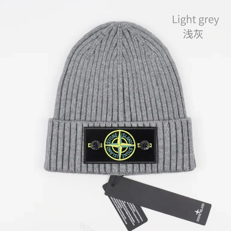 View 2 of Soft Ribbed Beanie with Stone Island Patch â€“ Everyday Warmth