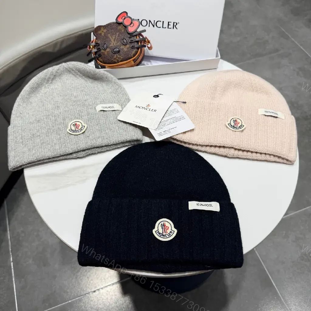View 2 of Beige Wool Knit Beanie, Subtle Crest, Everyday Luxury