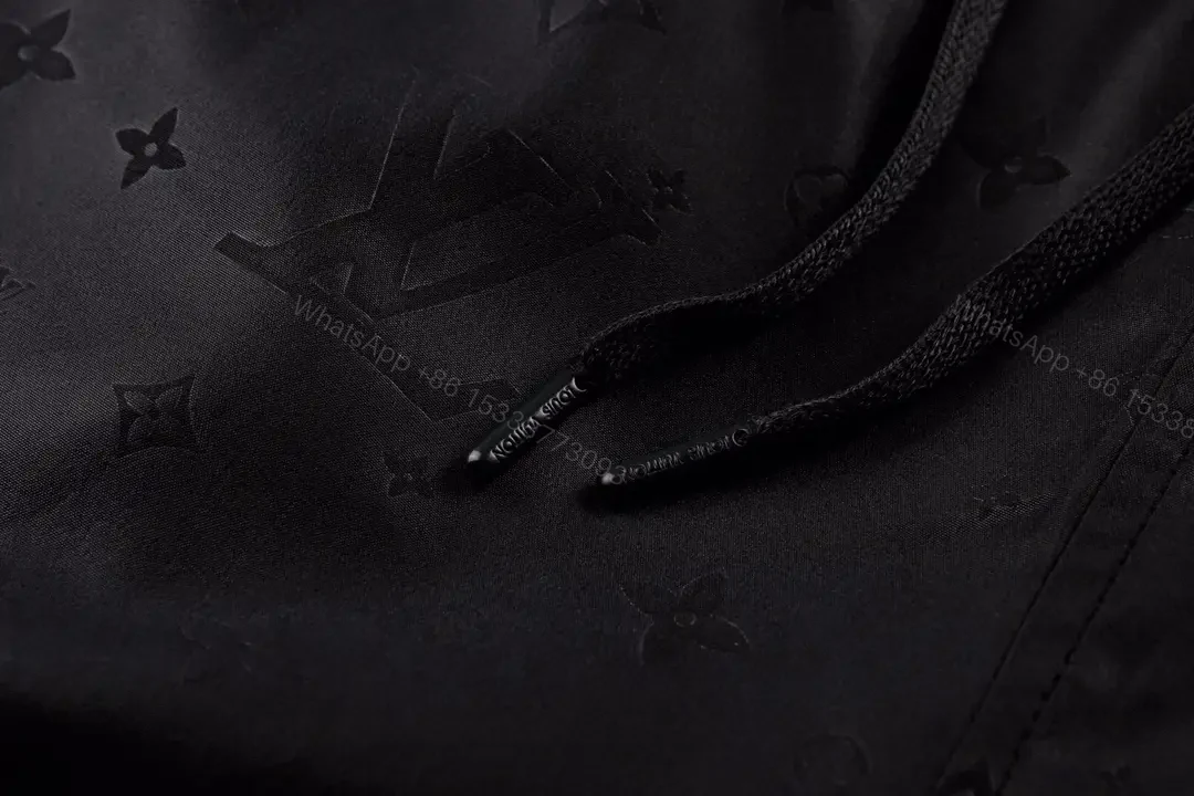 View 9 of Black Leather-Look Louis Vuitton Scan Shorts with Drawstring