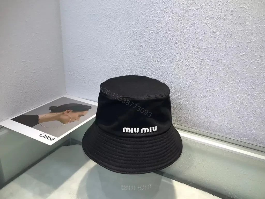 View 8 of Crisp White Miu Miu Bucket Hat: Iconic Logo Shield