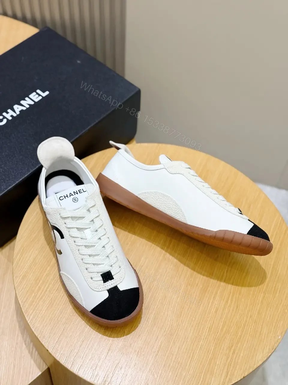 View 2 of White Leather Sneaker Black Toe Classic Chanel Logo Shoes