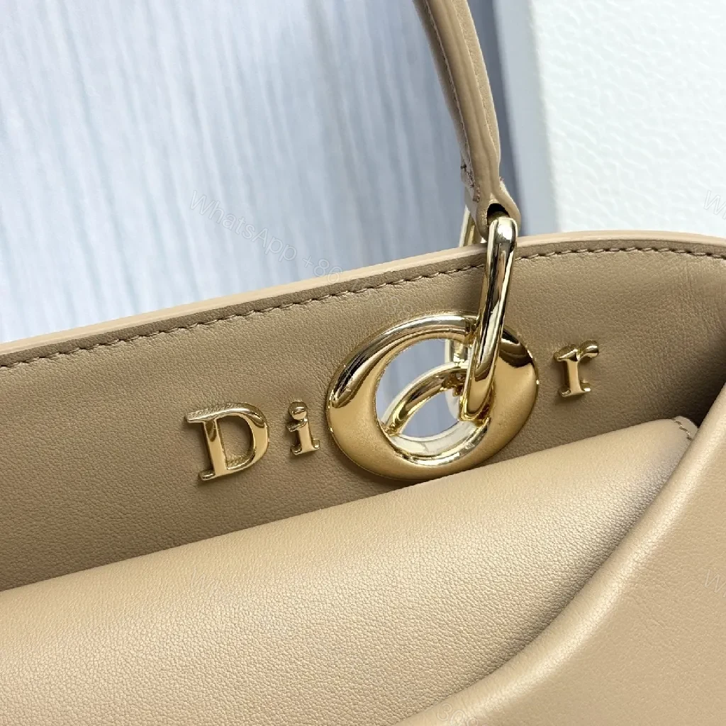 View 5 of Geometric Leather Mini Bag: Chic Bow Accent, Gold Hardware