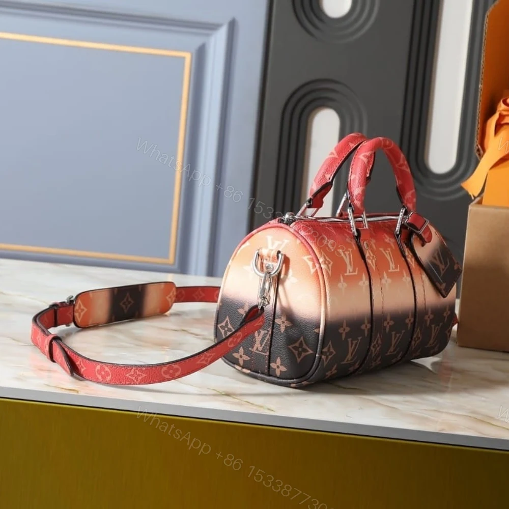 View 3 of Louis Vuitton Keepall Bandoulière 25 Orange 25Cm M28074