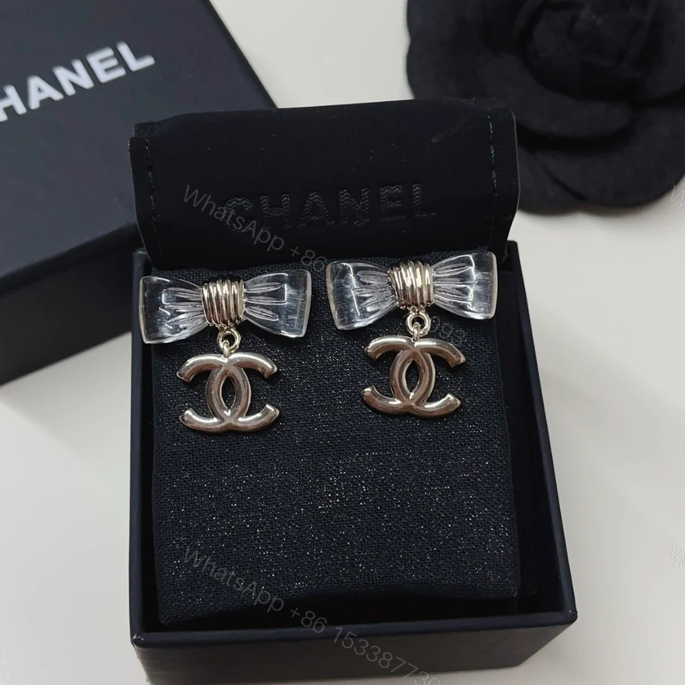 View 7 of CHANEL D25 CC BOW EARRINGS GOLD METAL ABF537 B19997 NAFVG