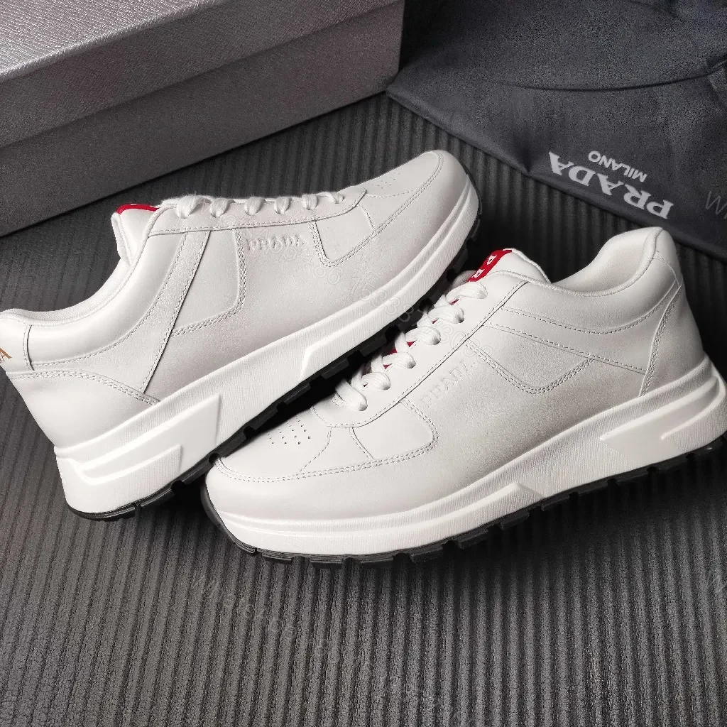 View 8 of Minimalist White Leather Trainers with Red Accent - Modern Comfort Lux